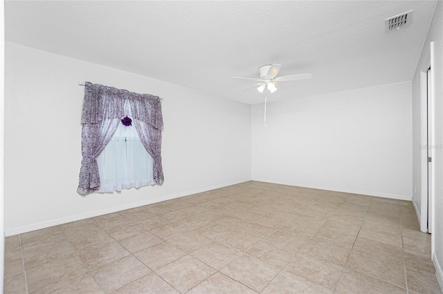 empty room with ceiling fan