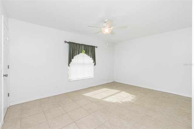 unfurnished room with ceiling fan