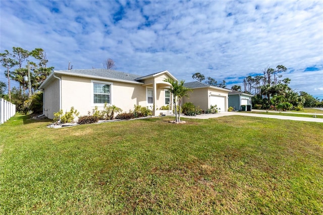 single story home with a garage and a front yard