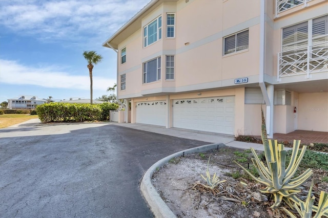 view of home's exterior with a garage