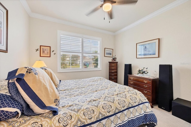 bedroom with ceiling fan, crown molding, and light colored carpet