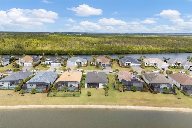 drone / aerial view with a water view