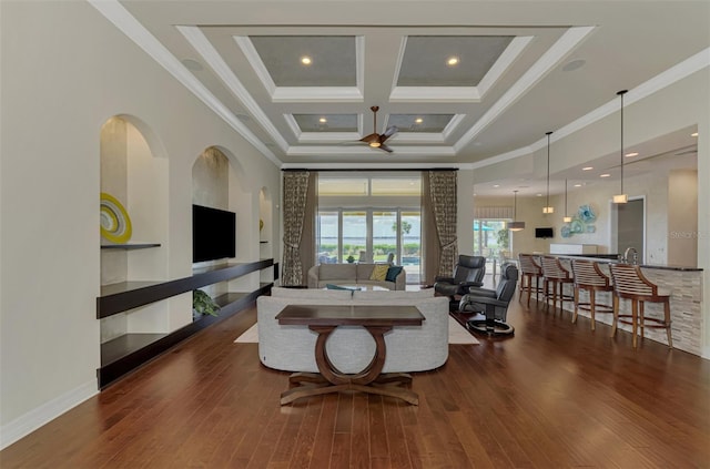 living room featuring coffered ceiling, ceiling fan, crown molding, and dark hardwood / wood-style floors