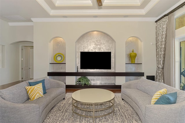 living room with built in shelves, crown molding, and hardwood / wood-style flooring