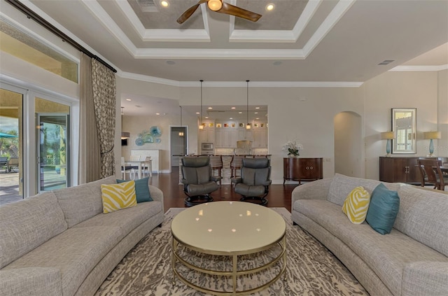 living room with crown molding, ceiling fan, coffered ceiling, and hardwood / wood-style flooring