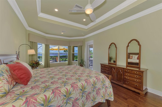 bedroom featuring access to exterior, a tray ceiling, ceiling fan, and ornamental molding