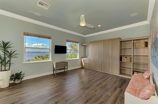 living room with ceiling fan, dark wood-type flooring, and ornamental molding