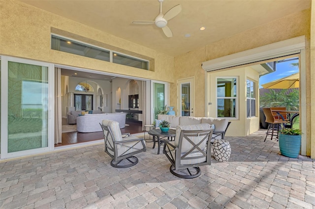 view of patio / terrace with outdoor lounge area and ceiling fan