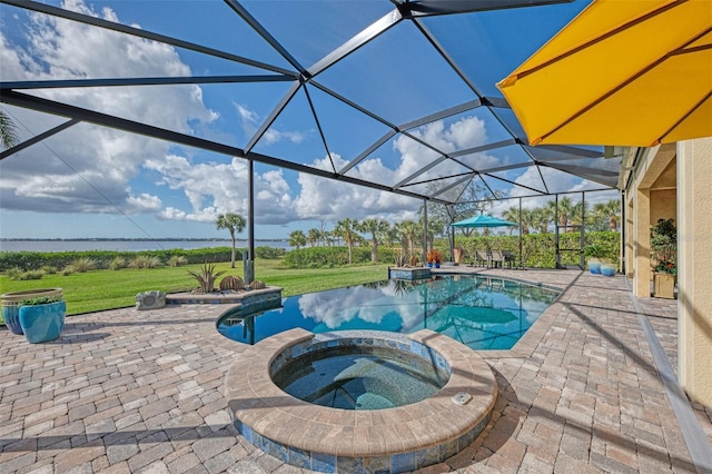 view of swimming pool with glass enclosure, a patio area, a yard, and an in ground hot tub