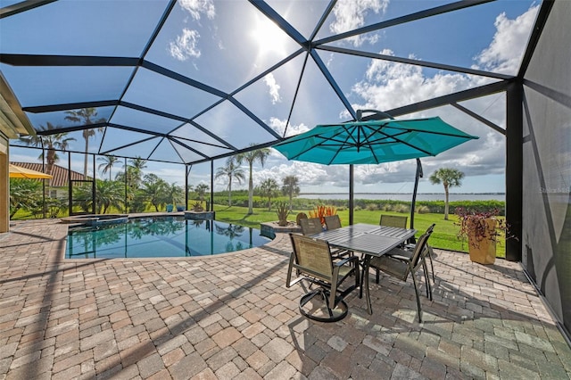 view of pool featuring a lanai, a patio, and an in ground hot tub