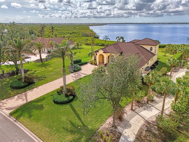 bird's eye view with a water view