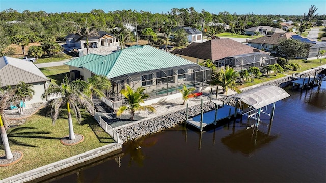 9567 Honeymoon Dr, Port Charlotte, FL 33981 - dock featuring boat lift, a water view, an outdoor pool, and glass enclosure
