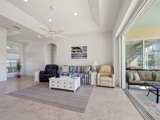 living room featuring ceiling fan