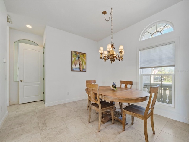 9567 Honeymoon Dr, Port Charlotte, FL 33981 - dining space featuring a chandelier and recessed lighting