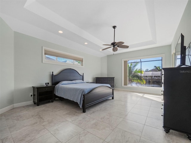 9567 Honeymoon Dr, Port Charlotte, FL 33981 - bedroom featuring a tray ceiling, recessed lighting, and ceiling fan