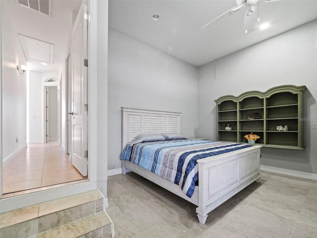 9567 Honeymoon Dr, Port Charlotte, FL 33981 - bedroom with light tile patterned floors, attic access, ceiling fan, and recessed lighting