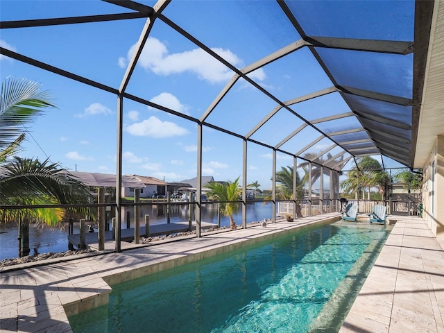 9567 Honeymoon Dr, Port Charlotte, FL 33981 - outdoor pool with a water view, a patio area, and a lanai