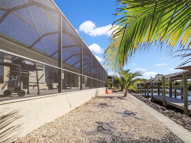 view of home's exterior with a lanai