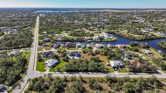 9567 Honeymoon Dr, Port Charlotte, FL 33981 - aerial view of property's location featuring nearby suburban area and a nearby body of water