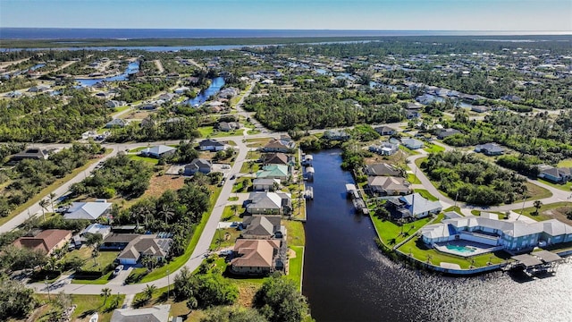 9567 Honeymoon Dr, Port Charlotte, FL 33981 - aerial overview of property's location with nearby suburban area and a nearby body of water