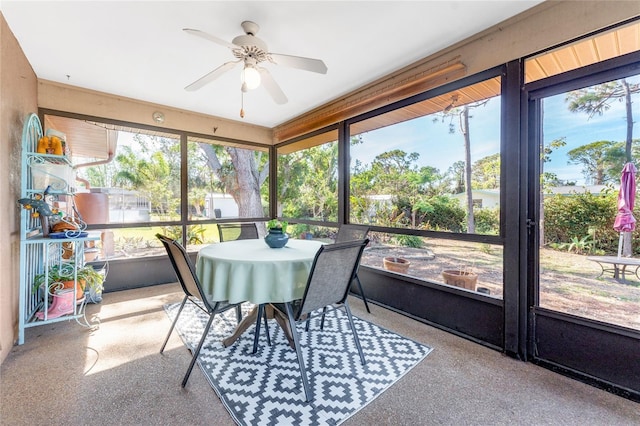 sunroom / solarium with ceiling fan