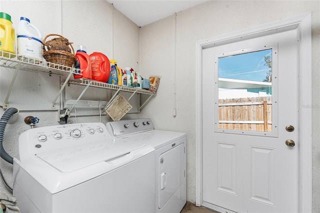 washroom with separate washer and dryer