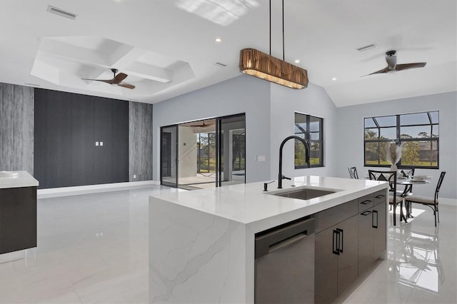 kitchen with dishwasher, sink, a wealth of natural light, and an island with sink