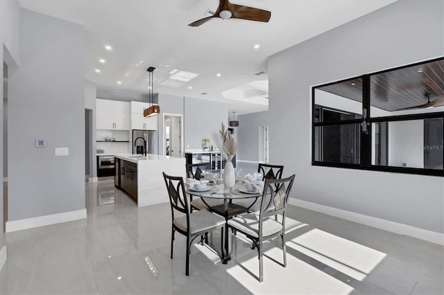 dining space featuring ceiling fan