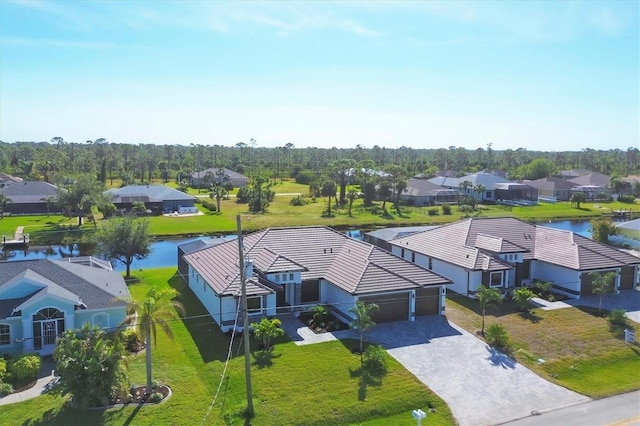 drone / aerial view featuring a water view