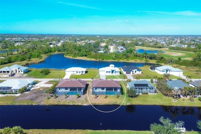 bird's eye view with a water view