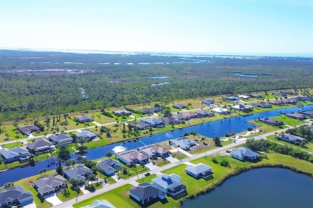 drone / aerial view featuring a water view