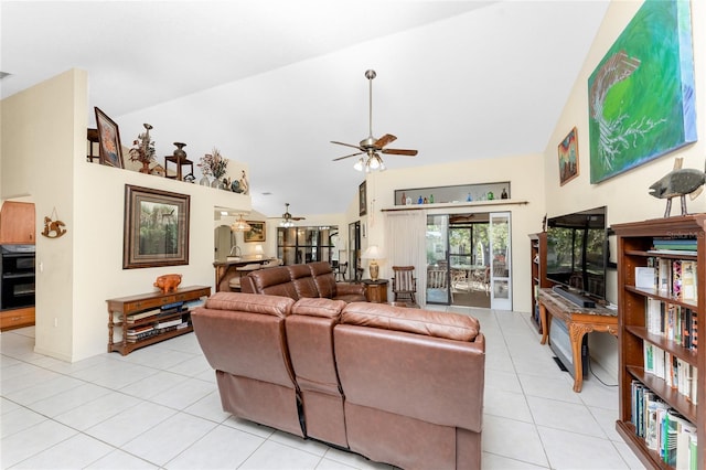 living room with high vaulted ceiling, ceiling fan, and light tile patterned flooring