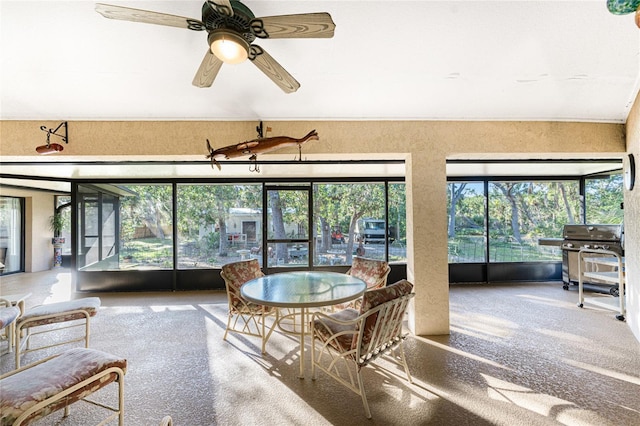 sunroom / solarium with ceiling fan