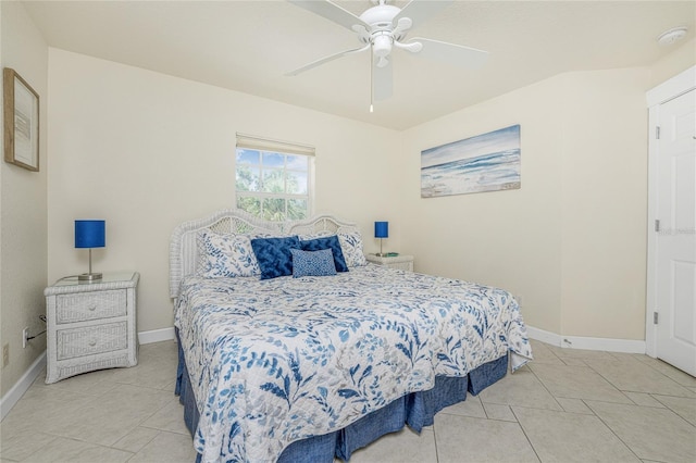 tiled bedroom with ceiling fan