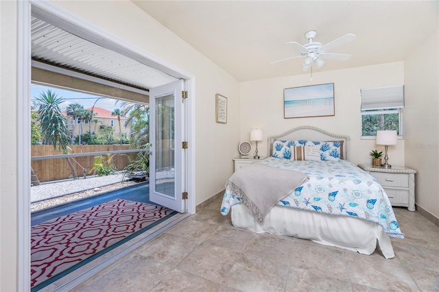 bedroom with ceiling fan, access to exterior, and multiple windows