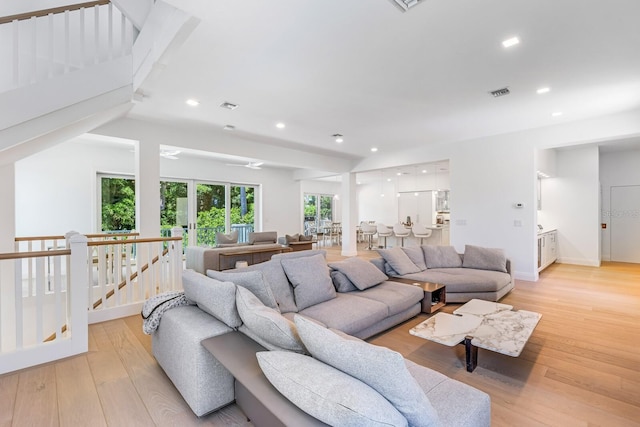 living room with light hardwood / wood-style flooring