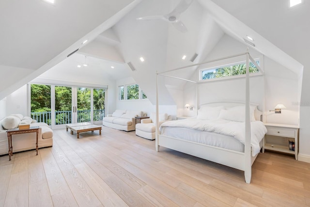 bedroom featuring light wood-type flooring, high vaulted ceiling, multiple windows, and ceiling fan