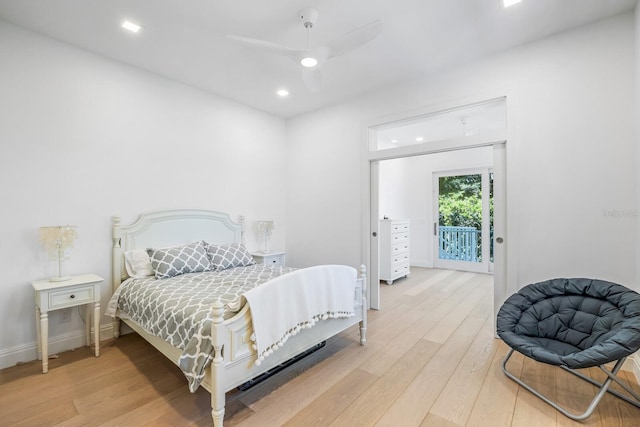 bedroom featuring access to exterior, ceiling fan, and hardwood / wood-style floors