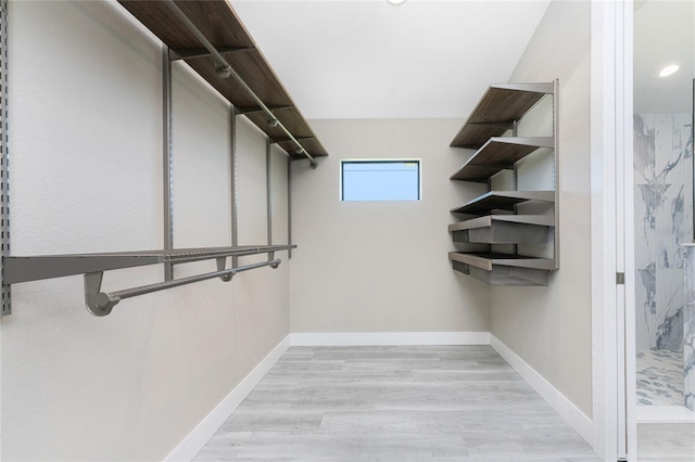 spacious closet with light wood-type flooring