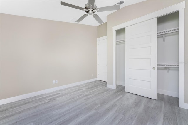 unfurnished bedroom with light hardwood / wood-style flooring and ceiling fan