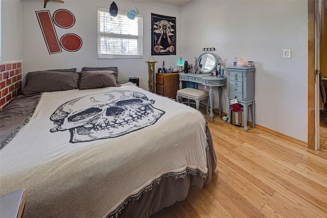 bedroom featuring hardwood / wood-style flooring