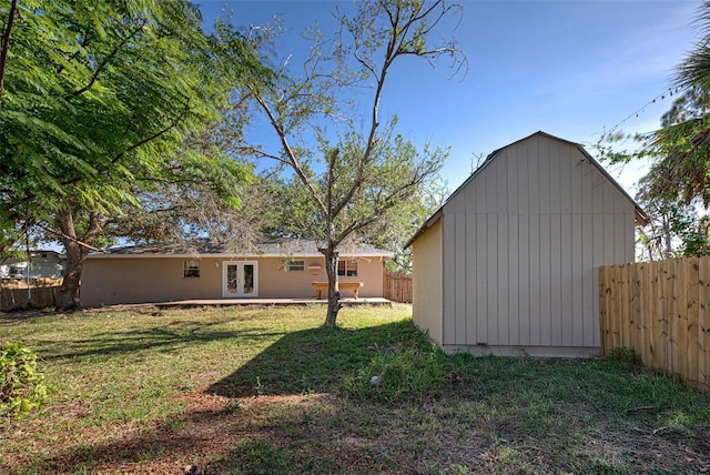 view of yard with french doors