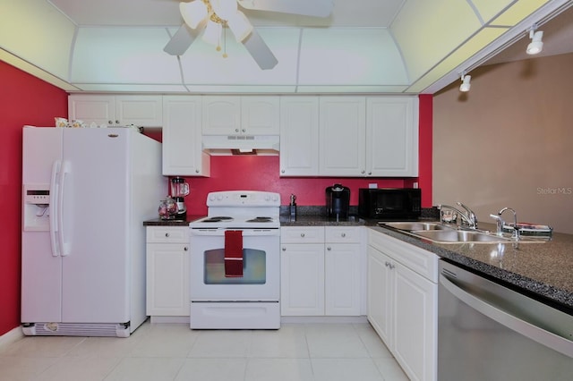 kitchen featuring white appliances, sink, ceiling fan, light tile patterned floors, and white cabinetry