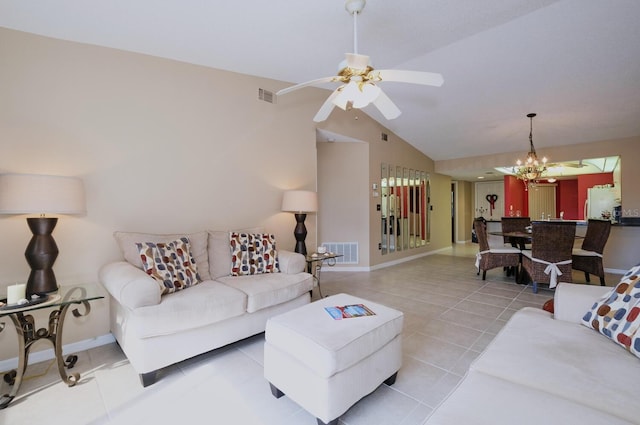 living room with light tile patterned floors, ceiling fan with notable chandelier, and vaulted ceiling