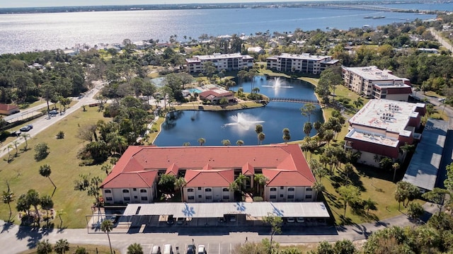 drone / aerial view featuring a water view