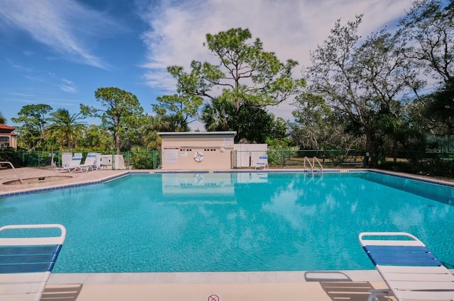 view of pool featuring a patio