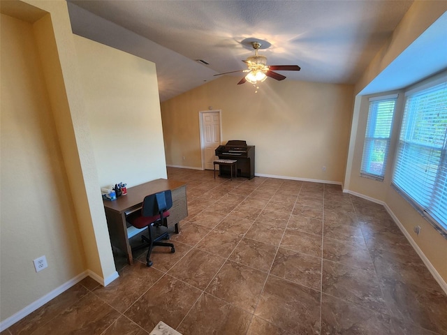 office featuring ceiling fan and lofted ceiling