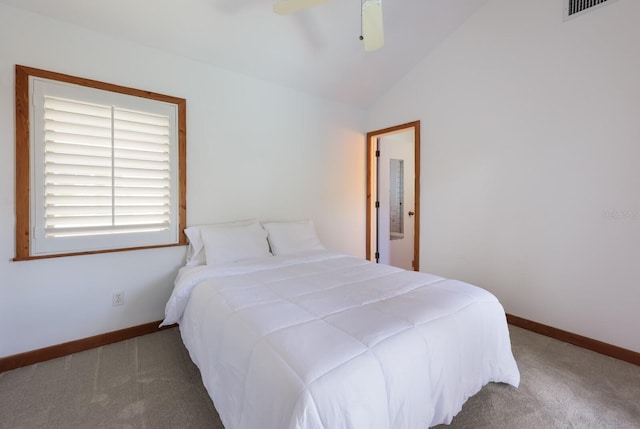 bedroom with carpet, ceiling fan, and lofted ceiling