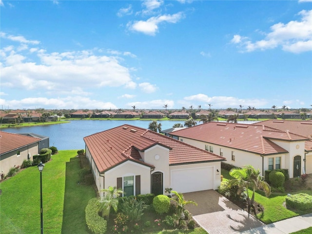 bird's eye view with a water view