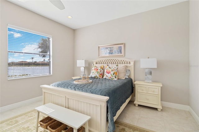 bedroom featuring light tile patterned floors and ceiling fan